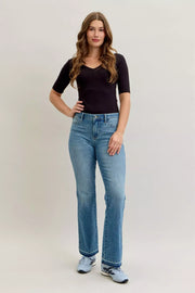 Woman wearing Judy Blue High-Waist Straight Leg Jeans, showcasing comfort and style in light blue denim.