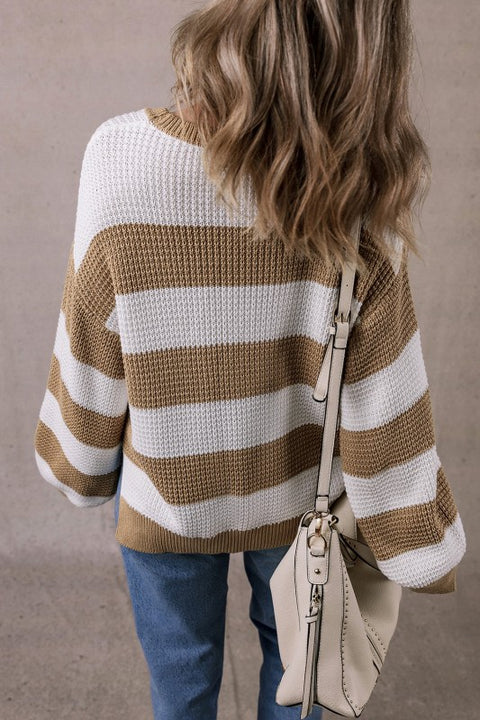 Arabella Striped Side-Slit Knit Sweater featuring bold color-block stripes and a relaxed drop-shoulder fit.