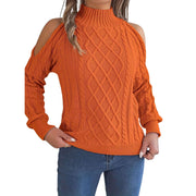 Model wearing a Cable Knit Cold Shoulder Turtleneck Sweater in orange, showcasing a cozy cable-knit design with stylish cutouts.