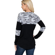 Back view of a woman wearing a Camouflage Contrast Lightweight Sweater Knit with drop-shoulder fit and curved hem.
