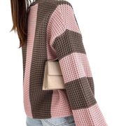 Cozy Color Block Oversized Sweater featuring pink and brown color blocks, showcasing a relaxed fit and stylish design.