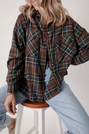 Model wearing brown plaid button-up shacket with relaxed fit front view