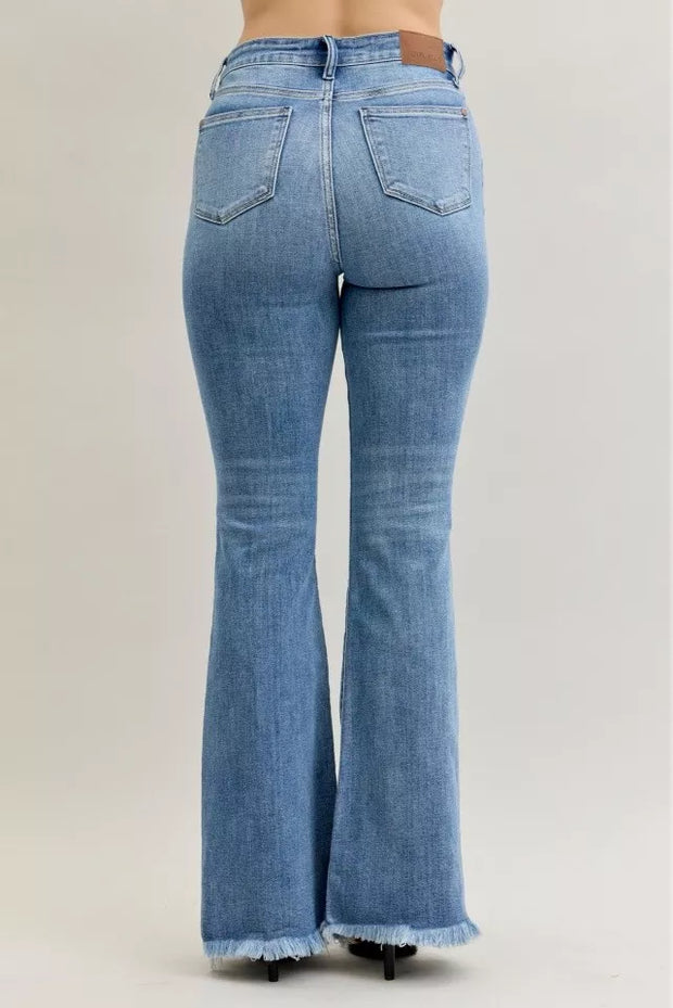 Judy Blue High Waist Flare Fray Hem Jeans with Pintuck Detail in light wash, showing back view and raw fray hem.
