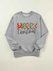 Flat lay of Merry Christmas Letter Sweatshirt showing bold holiday lettering and crewneck design on gray fleece fabric