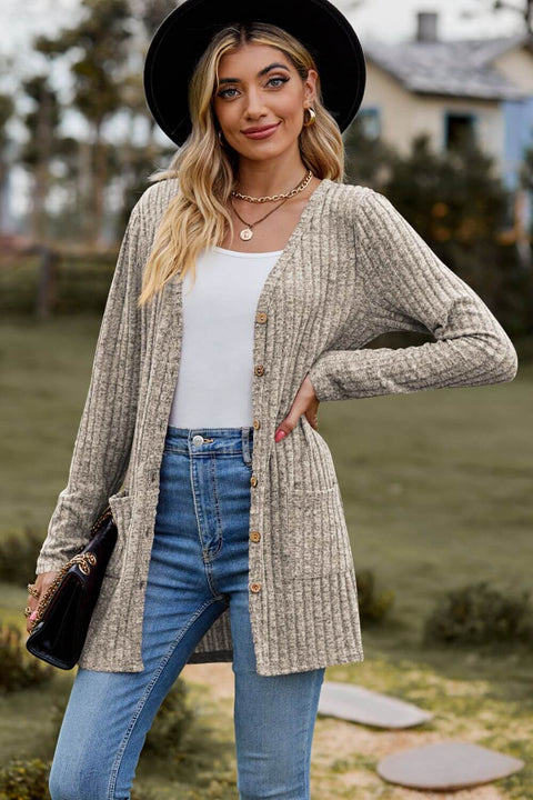 Ribbed Button-Up Cardigan with Pockets styled with jeans and a hat in a casual outdoor setting.