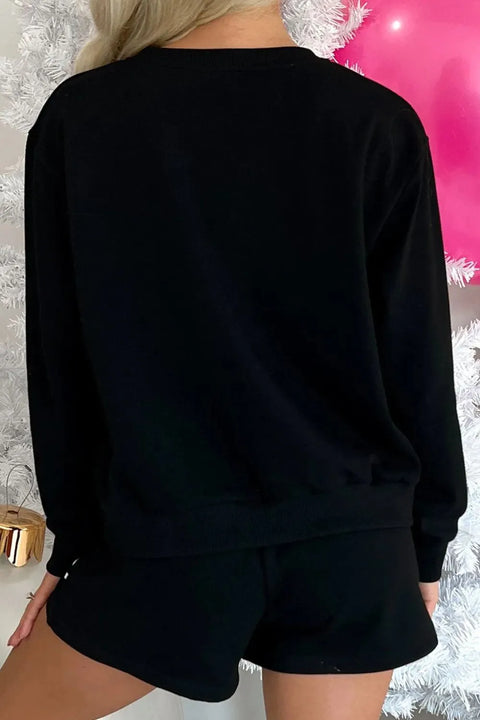 MERRY Sequin Lounge Set featuring a cozy black long-sleeve top and shorts, perfect for festive occasions.