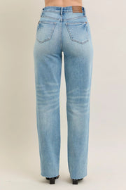 Back view of Judy Blue Plus Size High Waist Magic Star Destroy 90’s Straight Jeans showcasing the light blue wash and straight leg design.