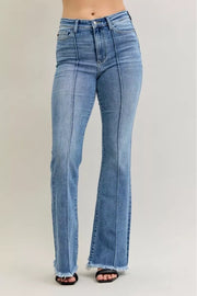 Judy Blue High Waist Flare Fray Hem Jeans with Pintuck Detail showcasing a flattering fit and trendy flared leg.