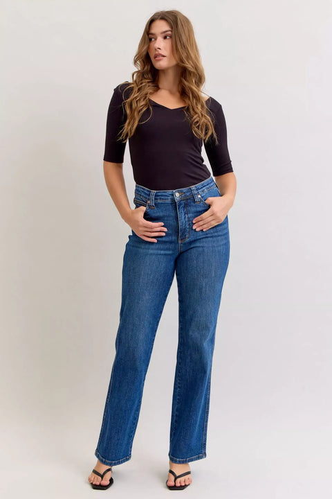Model wearing Judy Blue High-Waist Straight Leg Jeans, showcasing tummy control and a flattering fit.