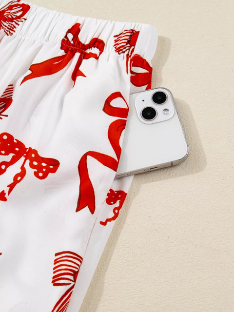 Buttoned Two-Piece Set featuring stylish shorts with a pocket holding a smartphone, blending comfort and chic fashion.