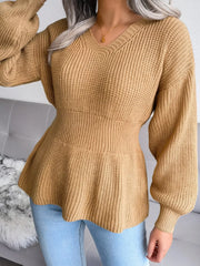 V-Neck Dropped Shoulder Sweater in beige, featuring ribbed details and peplum design, perfect for stylish layering.