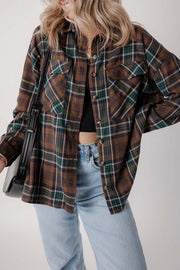 Oversized brown plaid button-up shacket with chest pockets and casual fall style