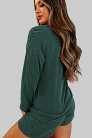 Model showcasing the Evergreen MERRY Corded Lounge Set in green, featuring long sleeves and relaxed-fit shorts.
