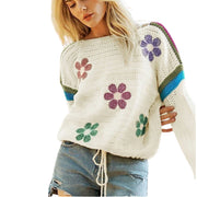 Boho Floral Cotton-Blend Eyelet Knit Sweater featuring colorful floral design and relaxed fit worn with denim shorts.