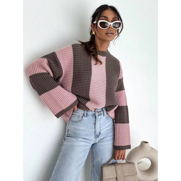 Cozy Color Block Oversized Sweater modeled by a woman wearing stylish sunglasses with relaxed jeans.