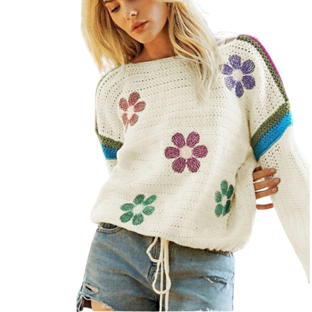 Boho Floral Cotton-Blend Eyelet Knit Sweater featuring colorful floral design and relaxed fit worn with denim shorts.