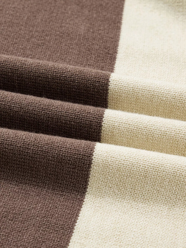 Close-up of the knit texture showcasing the color block pattern of the Color Block Drop Shoulder Sweater – Crew Neck Knit.