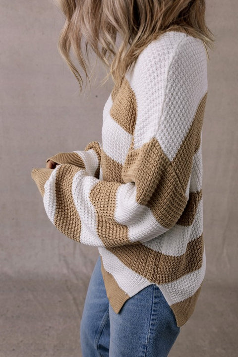 Arabella Striped Side-Slit Knit Sweater in beige and white with drop-shoulder design and side slits.