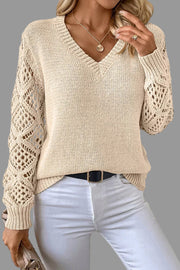 V-Neck Crochet Sleeve Sweater in beige, featuring elegant crochet sleeves and a flattering V-neck design.