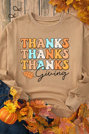 Close up of a THANKSGIVING Round Neck Dropped Shoulder Sweatshirt worn with jeans, featuring a stylish design for the festive season.