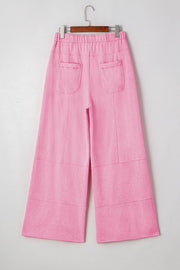 Mineral Wash Reverse Seam Drawstring Elastic Waist cargo pants in pink with adjustable waistband and functional pockets.