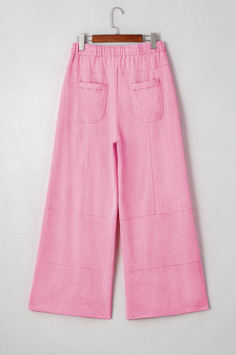 Mineral Wash Reverse Seam Drawstring Elastic Waist cargo pants in pink with adjustable waistband and functional pockets.