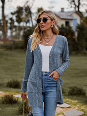 Ribbed Button-Up Cardigan with Pockets worn by a woman, styled casually with sunglasses and a tank top.