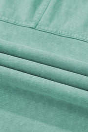 Mineral Wash Reverse Seam Drawstring Elastic Waist fabric detail in soft green hue showcasing texture and quality.