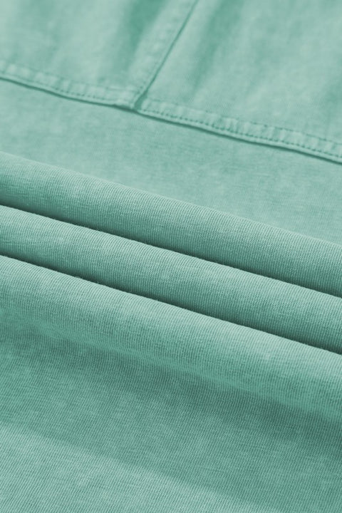 Mineral Wash Reverse Seam Drawstring Elastic Waist fabric detail in soft green hue showcasing texture and quality.
