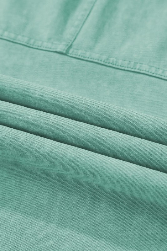 Mineral Wash Reverse Seam Drawstring Elastic Waist fabric detail in soft green hue showcasing texture and quality.