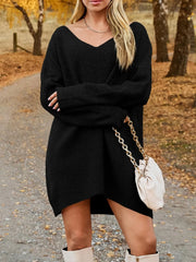 V-Neck Dropped Shoulder Sweater Dress – Cozy Knit Style worn outdoors with autumn scenery, featuring a relaxed silhouette.