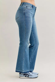 Judy Blue High-Waist Straight Leg Jeans – Tummy Control shown on a model from the side, highlighting the flattering fit.