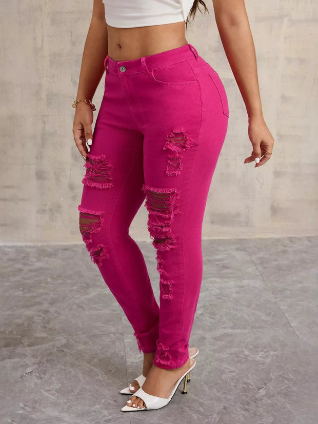 High-Waisted Distressed Skinny Jeans – Classic Denim Fit in vibrant pink with stylish rips and a flattering high-rise fit.
