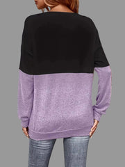 Back view of the Crisscross V-Neck Color Block Top featuring black and lavender color blocks.