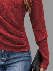 Model wearing a Surplice Long Sleeve Knit Top in a rich red color, showcasing ribbed detailing and a flattering neckline.