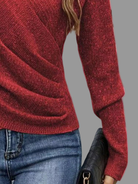Model wearing a Surplice Long Sleeve Knit Top in a rich red color, showcasing ribbed detailing and a flattering neckline.