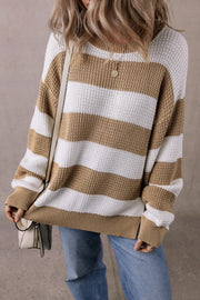 Arabella Striped Side-Slit Knit Sweater featuring bold color-block stripes and relaxed drop-shoulder fit.