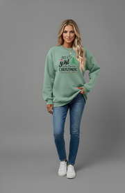 Letter Graphic Round Neck Sweatshirt featuring a Christmas design worn by a woman, paired with jeans.