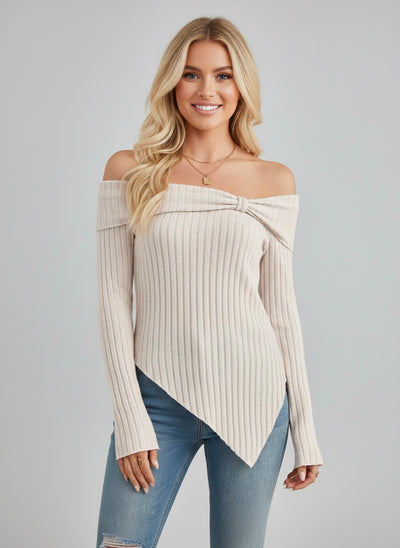 Model wearing an Off-Shoulder Ribbed Knit T-Shirt with an asymmetric hem, showcasing a chic casual look.