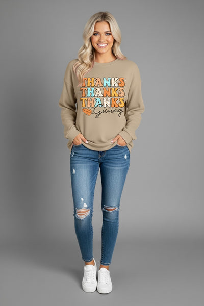 THANKSGIVING Round Neck Dropped Shoulder Sweatshirt worn with jeans, featuring a stylish design for the festive season.