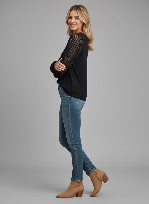Model wearing the Lace Detail Seam Top featuring lace accents on sleeves for a classic everyday style.