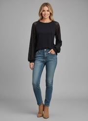 Model wearing the Lace Detail Seam Top featuring lace accents on sleeves for a classic everyday style.