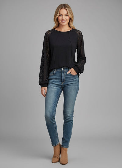 Model wearing the Lace Detail Seam Top featuring lace accents on sleeves for a classic everyday style.