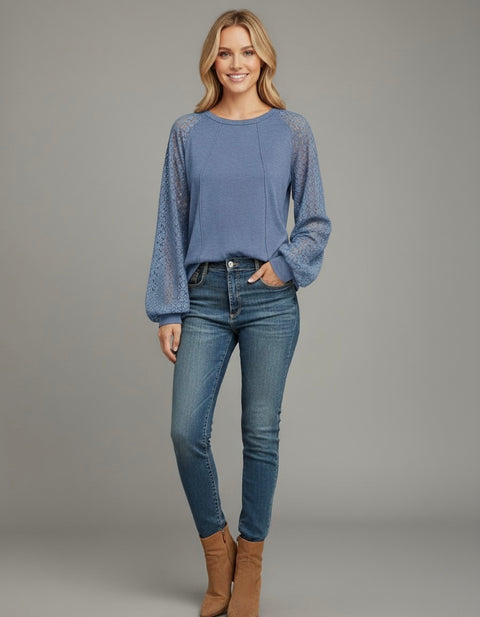 Model wearing the Lace Detail Seam Top featuring lace accents on sleeves for a classic everyday style.