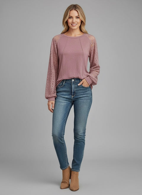 Model wearing the Lace Detail Seam Top featuring lace accents on sleeves for a classic everyday style.