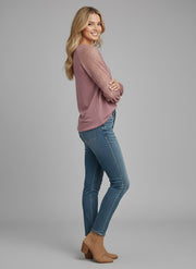 Model wearing the Lace Detail Seam Top featuring lace accents on sleeves for a classic everyday style.