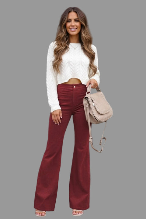 Full Size Hight Waist Bootcut Pants Plus Size styled with a white sweater and brown handbag, featuring a sleek bootcut design.