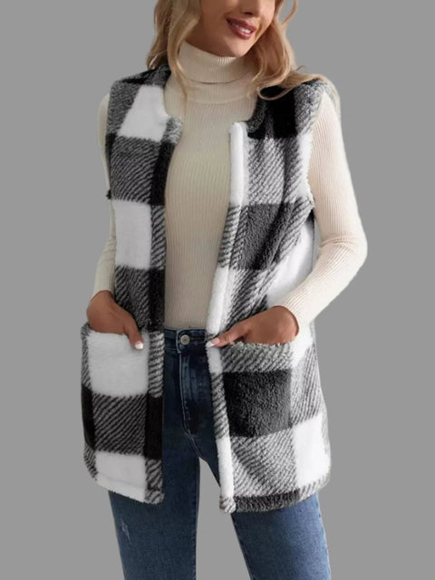 Plaid Sherpa Vest Coat worn over a white turtleneck, showcasing its relaxed fit and cozy texture.