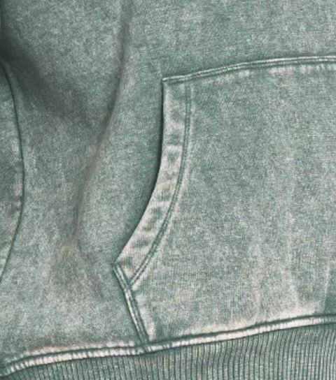 Close-up of the Zenana Fleece Acid Wash Kangaroo Pocket Hoodie showcasing the unique acid wash texture and pocket detail.