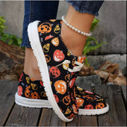 Halloween Pumpkin Print Round Toe Sneakers with colorful pumpkin patterns on comfortable canvas shoes.